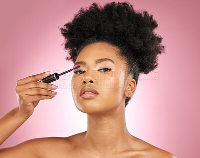 Buy stock photo Mascara, makeup and beauty portrait of a woman for skincare, wellness and dermatology glow. Volume, eyelash and face cosmetics of a black female model with facial shine on a pink background in studio