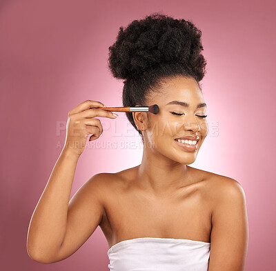 Buy stock photo Makeup, smile and black woman with brushes, beauty and dermatology against a pink studio background. Female person, skincare or happy model with cosmetic tools,  aesthetic and grooming with self care