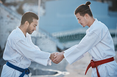 Buy stock photo Men, karate and shaking hands at training fight with respect, fitness and start workout contest for development. Martial arts coaching, together or peace for exercise, zen mindset or combat sports