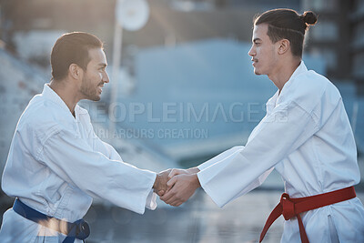 Buy stock photo Men, karate and handshake at training fight for respect, fitness or workout contest for development. Martial arts teacher, coaching and smile for exercise, zen mindset or  outdoor for combat sports