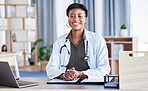 Black woman, portrait and doctor in office for medical services, advice and consulting in clinic. Happy female therapist, healthcare worker and consultant at desk in hospital for wellness management