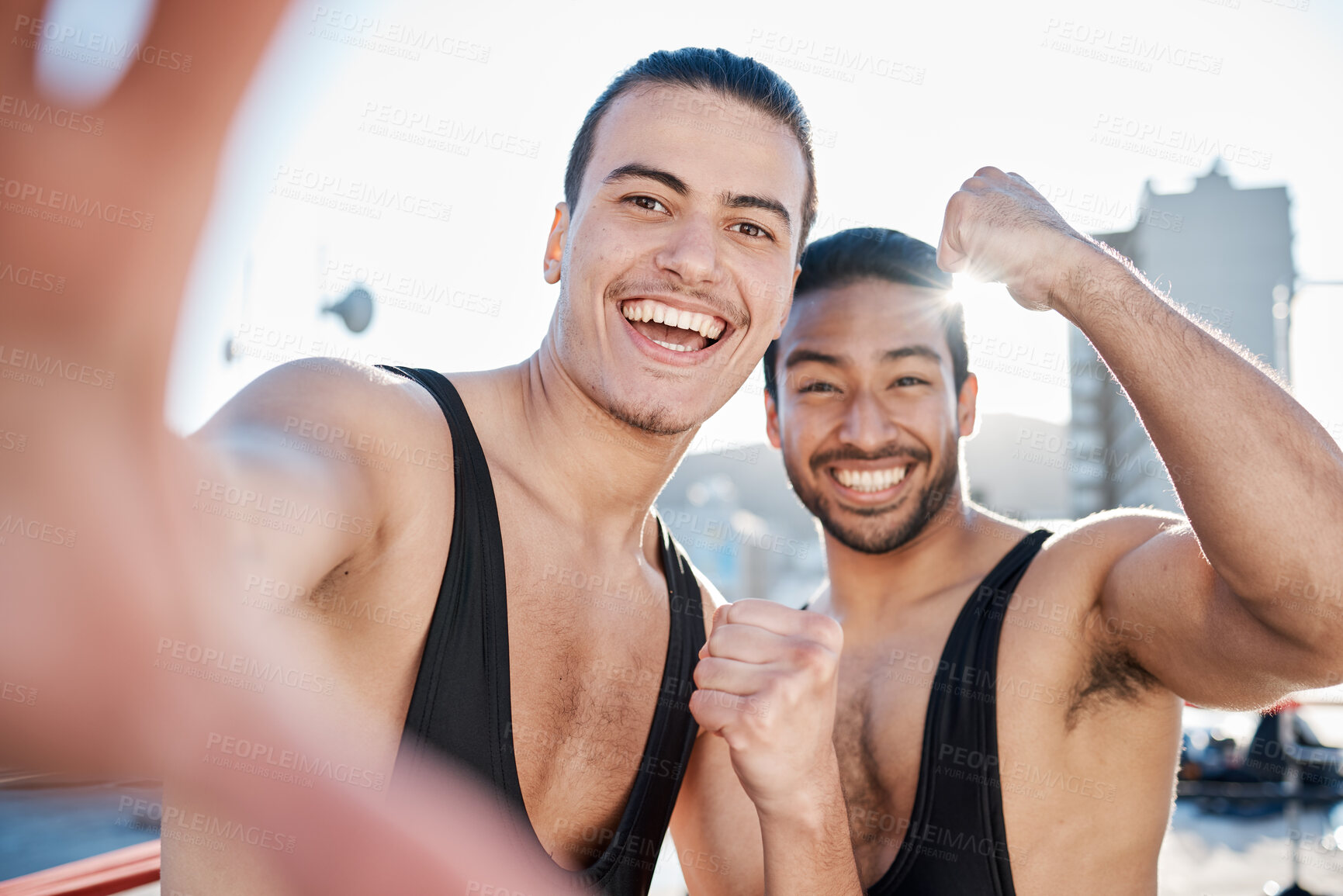 Buy stock photo Men, fight and selfie for sport, fitness partnership or smile with fist celebration, pride of outdoor on rooftop. Wrestling friends, happy and memory with photography, social media or profile picture