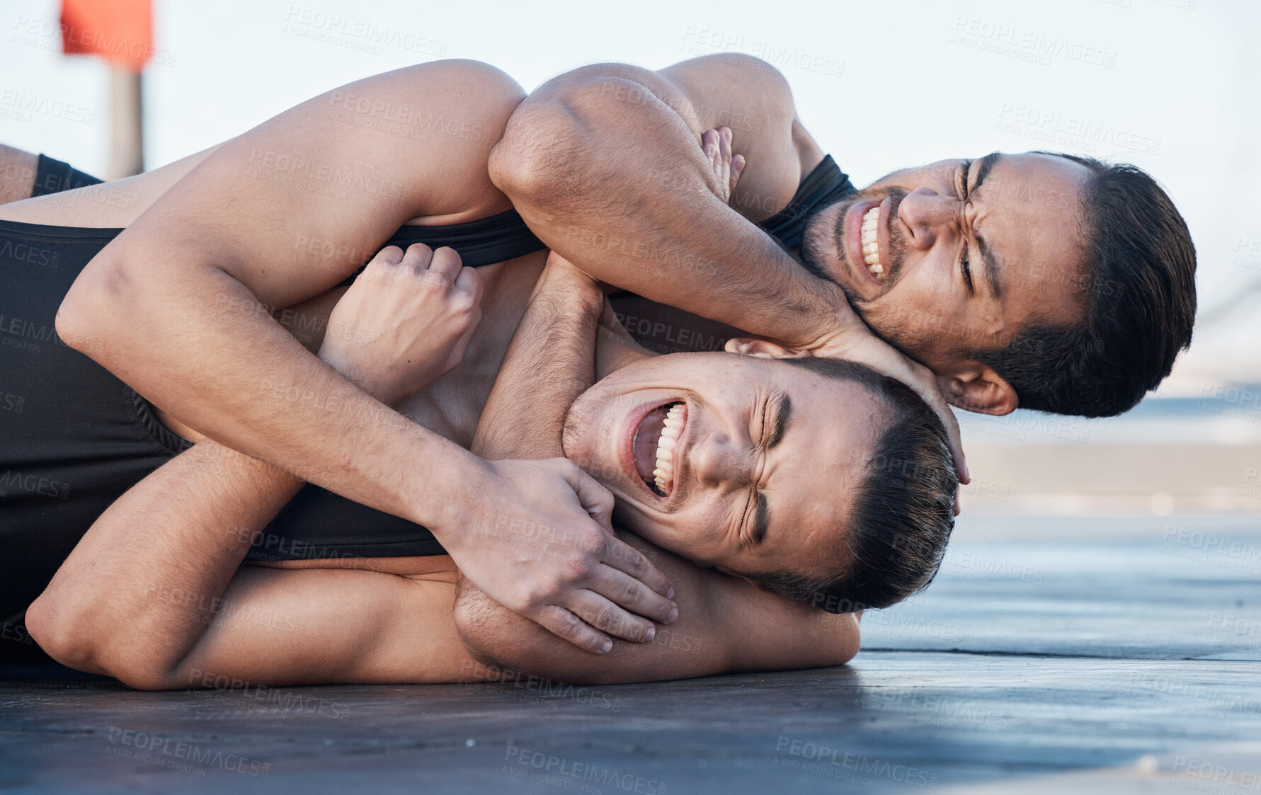 Buy stock photo Men fight, mma and choke hold outdoor for competition, exercise and workout. Wrestling, grappling and people in battle, challenge and combat for martial arts, fitness sports and training with pain