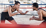 Men, wrestling and sport fight in ring with challenge, patient and focus for contest in metro cbd. Combat athlete, martial arts coach and thinking for mma, competition or strategy in workout on roof