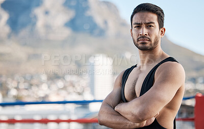 Buy stock photo Man, wrestling and arms crossed in portrait for sport, ring and fitness on rooftop, strong muscle and mindset. Young athlete, serious face and healthy body for fight, mma and training in Cape Town