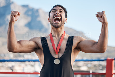 Buy stock photo Winner man, wrestling medal and celebration with scream, success and fist in air for outdoor contest in Cape Town. Young athlete, wrestler and champion with goals, achievement and fight competition