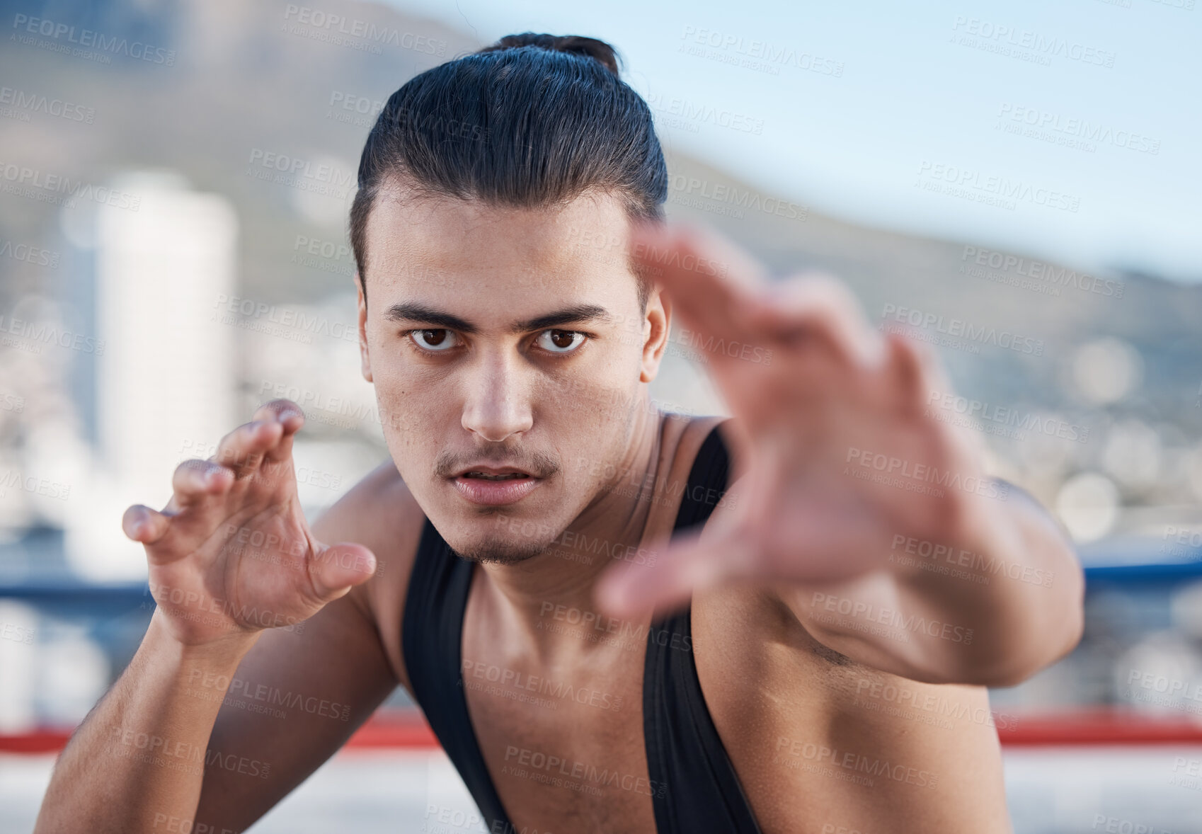 Buy stock photo Fight, portrait and a man doing karate in the city, training for taekwondo or sports competition. Serious, fitness and a professional athlete with a move for a workout or martial arts exercise