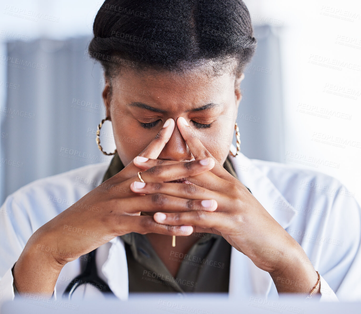 Buy stock photo Tired doctor, African woman and headache at desk, clinic office or stress with thinking in workplace. Overworked medic, fatigue and burnout in hospital, worry or anxiety for mental health in wellness