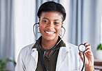 Doctor, portrait and happy woman with stethoscope for heartbeat, healthcare services and cardiology. Face, black female medical worker and listening tools to check heart, lungs and breathing test