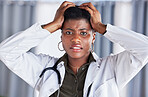 Frustrated, portrait and a black woman or doctor with a mistake in healthcare, surgery fail or problem. Headache, burnout and an African surgeon with clinic stress, medical crisis or anxiety