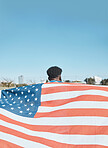 American flag, back and sports man with mockup space on blue sky outdoor. Usa banner, national and athlete with patriotism, pride or representation to support country, motivation and independence day