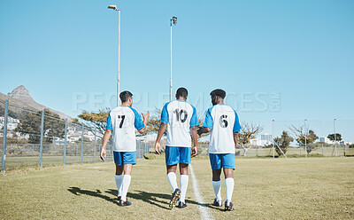 Buy stock photo Soccer, team and walking on field with back or conversation at training or competition in out with grass. Fitness, teamwork and stadium with football player after game or collaboration at club.