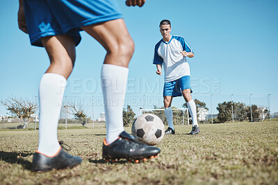 Buy stock photo Football player, ball and game on field for team competition, game or match training, exercise and strategy. Goal, action and young people or men with soccer or legs cardio on sports pitch or ground