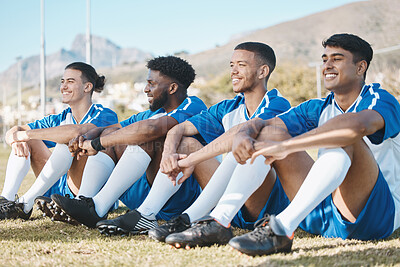 Buy stock photo Happy soccer players, relax or team on a field for a sports game together in summer on resting break. Smile, stadium or group of football athletes sitting after fitness exercise, training or match