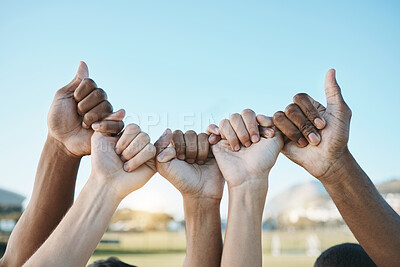 Buy stock photo Fist, hands and group with diversity for outdoor celebration or team building together for support, motivation and solidarity. Hand, ready for sport or teamwork with community of people on blue sky