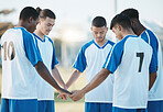 Stadium, support or soccer team praying in match for solidarity, motivation or mission in sports game. Faith unity, God or football players holding hands ready for group exercise or fitness training