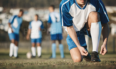 Buy stock photo Tie, man or soccer player with shoes on football field in training, exercise or workout in Brazil. Lace, stadium or hands of athlete ready to start fitness match or sports game with boots or footwear