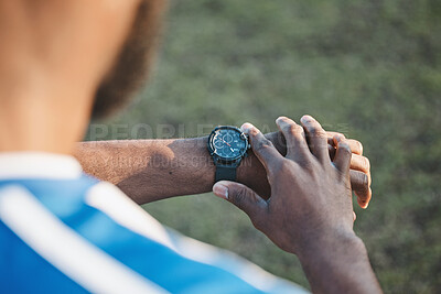 Buy stock photo Hands, man or soccer player with smart watch on field to monitor time, training or exercise progress. Wellness, performance or healthy sports athlete with timer to check running workout or fitness 