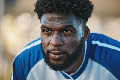 Buy stock photo Soccer player, thinking or tired black man in sports training, game or match breathing on a field pitch. Face, fatigue or exhausted African athlete in football workout or fitness exercise on break 