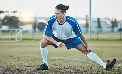 Buy stock photo Thinking, sports or soccer player stretching legs on football field in training, exercise or workout in Brazil, Fitness, warm up or serious male athlete ready to start practice match or stadium game