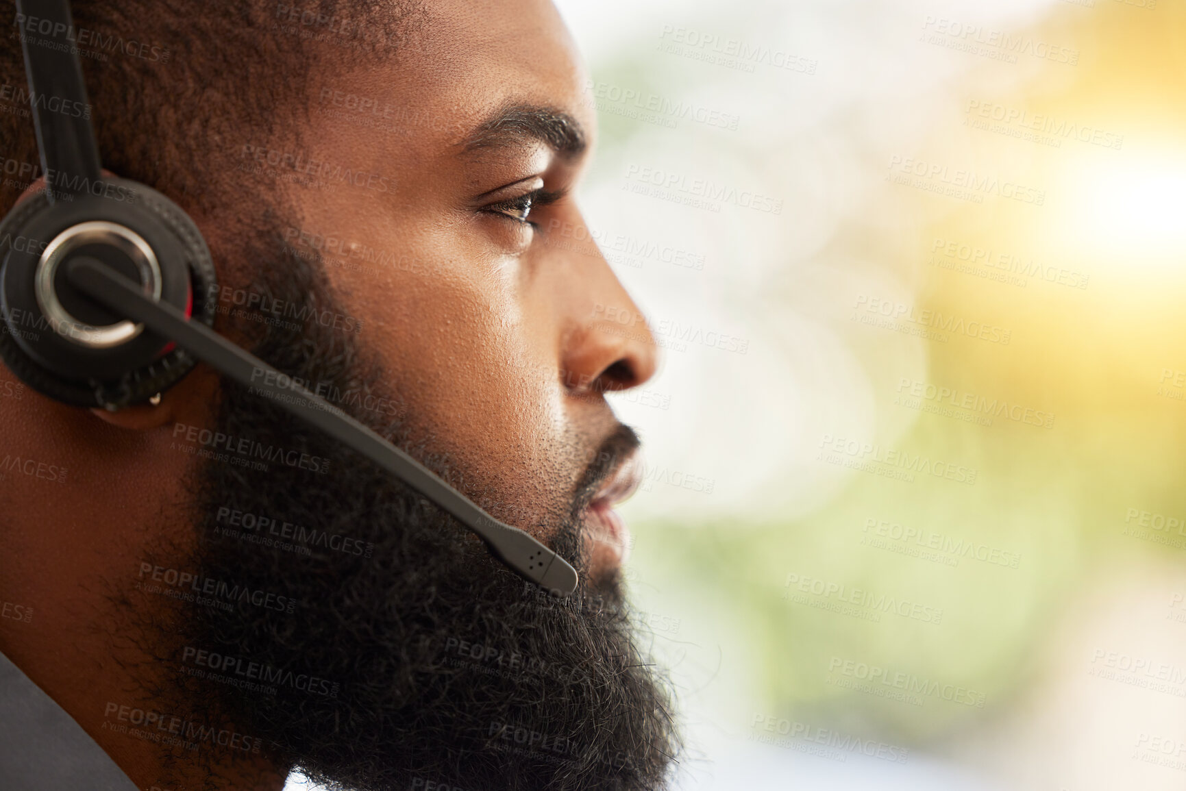 Buy stock photo Face, profile of black man and call center, headset with mic and customer service employee, CRM and mockup space. Male consultant at help desk job, flare and serious for contact us and tech support