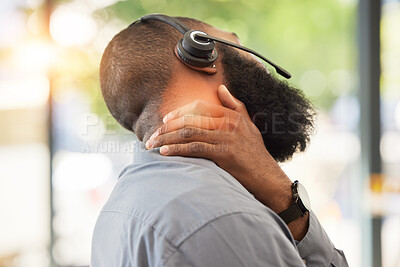 Buy stock photo Black man, neck pain and working in call center, injury and sick customer service employee with health problem. Male consultant, CRM and headset with mic, fibromyalgia and muscle tension with stress