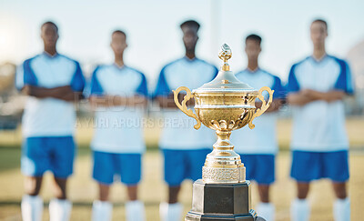 Buy stock photo Soccer team, trophy and sports tournament for winning challenge, teamwork or event on the field outdoors. Gold award, championship or prize with group standing ready in football competition or league