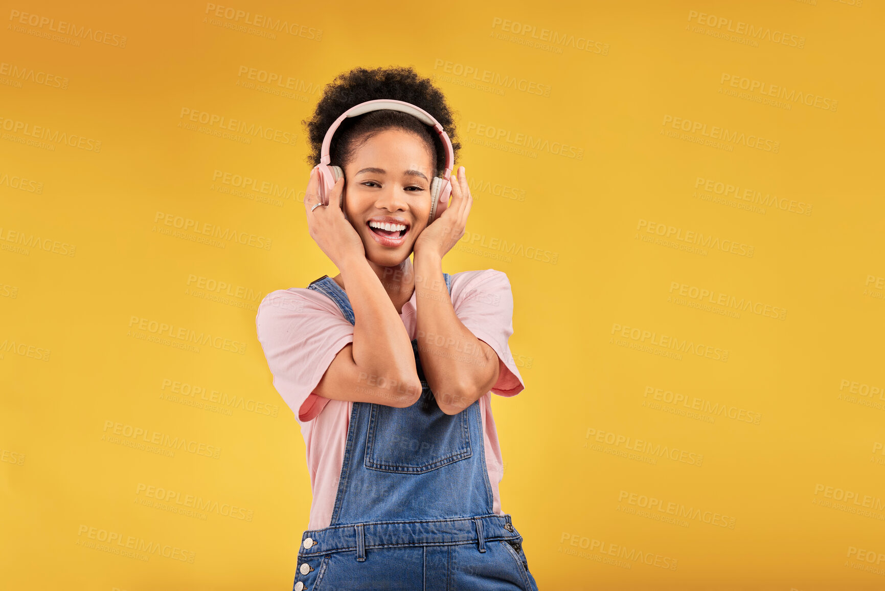 Buy stock photo African girl, headphones and studio portrait with smile, youth fashion and sound by yellow background. Young student, gen z woman or model with audio tech, streaming subscription and happy for music