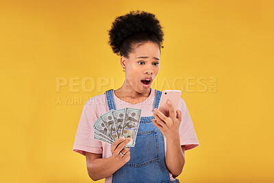 Buy stock photo Surprise, money and winner with black woman and phone in studio for success, prize or deal. Bonus, lottery and online payment with person and cash on yellow background for dollar, profit or giveaway