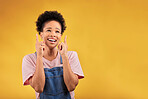 Smile, pointing and mockup with a black woman on a yellow background in studio for advertising or marketing. Sale, presentation or information with a happy young female brand ambassador showing space