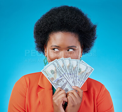Buy stock photo Cash, hide and a black woman lottery winner on a blue background in studio holding money for finance. Savings, investment or economy growth with a young female person excited for financial freedom