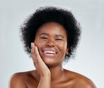 Happy black woman, portrait and afro in skincare, natural beauty or cosmetics against a white studio background. Face of excited African female person smile for perfect skin, spa or facial treatment