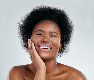 Buy stock photo Happy black woman, portrait and afro in skincare, natural beauty or cosmetics against a white studio background. Face of excited African female person smile for perfect skin, spa or facial treatment