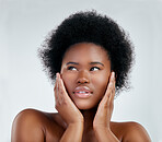 Self care, beauty and African woman in a studio with a natural, wellness or cosmetic face routine. Health, young and headshot of a female model with facial dermatology treatment by a gray background.