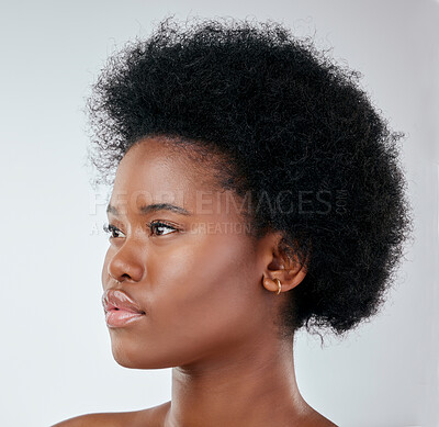 Buy stock photo Beauty, black woman and natural hair in studio for cosmetic, treatment and routine on white background. Haircare, face and African model with healthy glow, styling and curly, fresh or confidence 