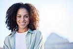 Happy, summer and portrait of a woman in the city for sun, smile and vacation with mockup. Travel, morning and headshot of a young girl with space for advertising on bokeh on a urban holiday