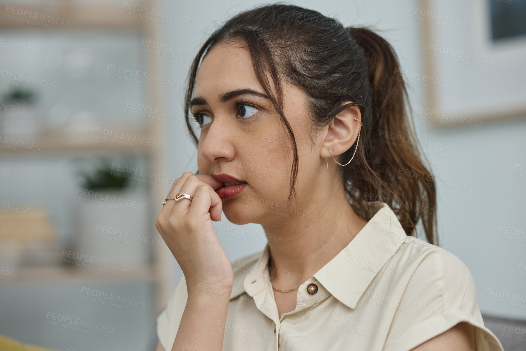 Buy stock photo Biting, nails and woman with anxiety, stress and mental health risk at home. Scared, fear and face of nervous female person bite nail in panic, worry and thinking of depression, problem and bad habit