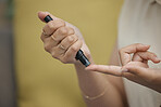 Hands, woman and blood sugar pen for diabetes in healthcare, medical testing or diabetic medicine. Closeup of person poke fingers with needle to check insulin, monitor glucose and glucometer results 