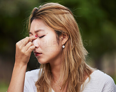 Buy stock photo Headache, park and asian woman with stress pain in nature worried due to anxiety, fear and sad with burnout. Fatigue, sick and person or student with a problem, frustrated and confused in a crisis