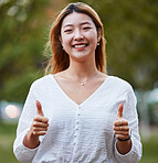 Thumbs up, happy and portrait of Asian woman in park for support, relaxing and happiness outdoors. Smile, nature and face of female person with hand gesture for agreement, thank you and yes sign