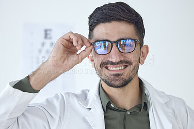 Buy stock photo Face, man and optometrist smile with glasses for vision, healthcare or wellness. Portrait, happy and doctor of ophthalmology with frame, expert optician or medical professional for eye care in clinic