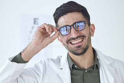 Buy stock photo Face, man and happy optometrist with glasses for vision, healthcare or wellness. Portrait, smile and doctor of ophthalmology with frame, expert optician or medical professional for eye care in clinic