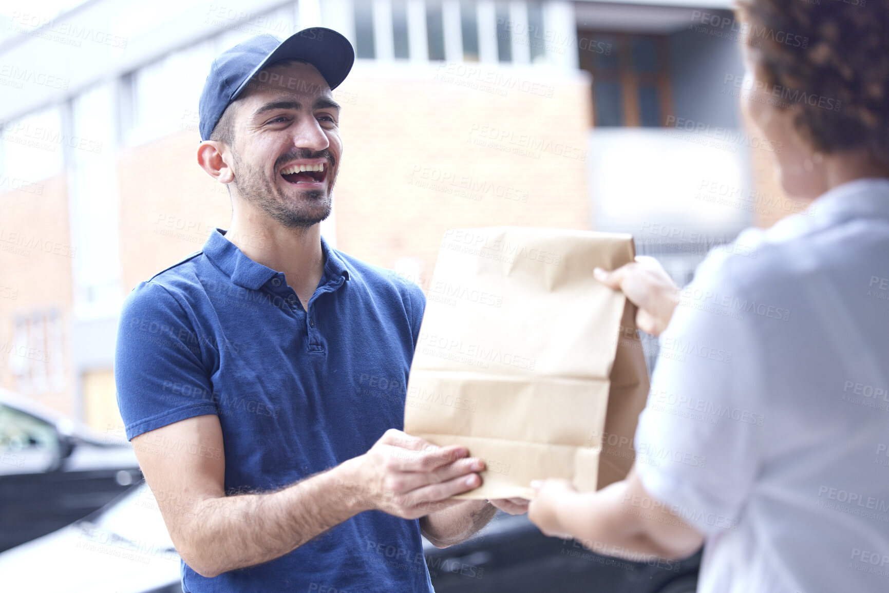 Buy stock photo Happy man, delivery and paper bag in the city for courier service, fast food or online shopping at the door. Male person giving customer parcel, package or order for transport, logistics or ecommerce