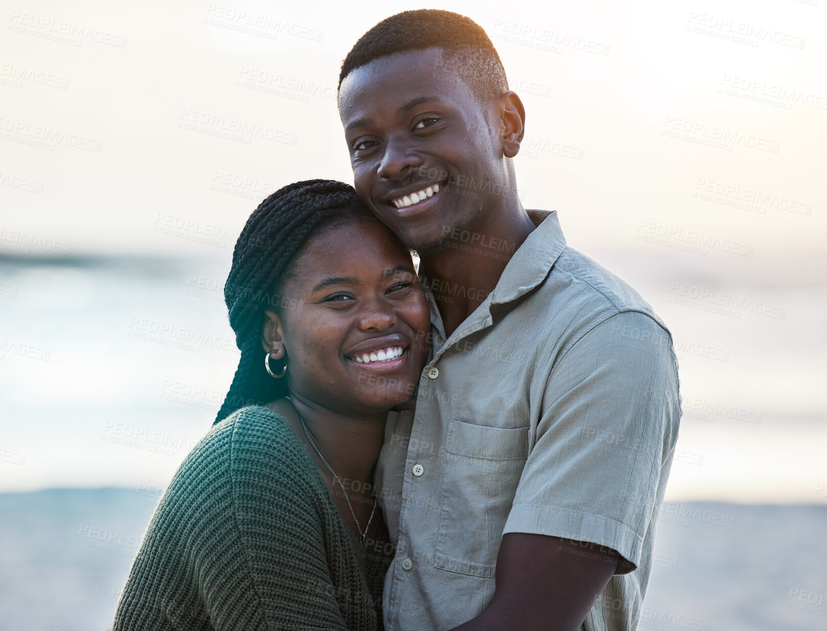 Buy stock photo Black couple, happy and portrait outdoor at the beach with love, care and commitment. Smile on face of young african man and woman together on vacation, holiday or sunset travel adventure in Jamaica