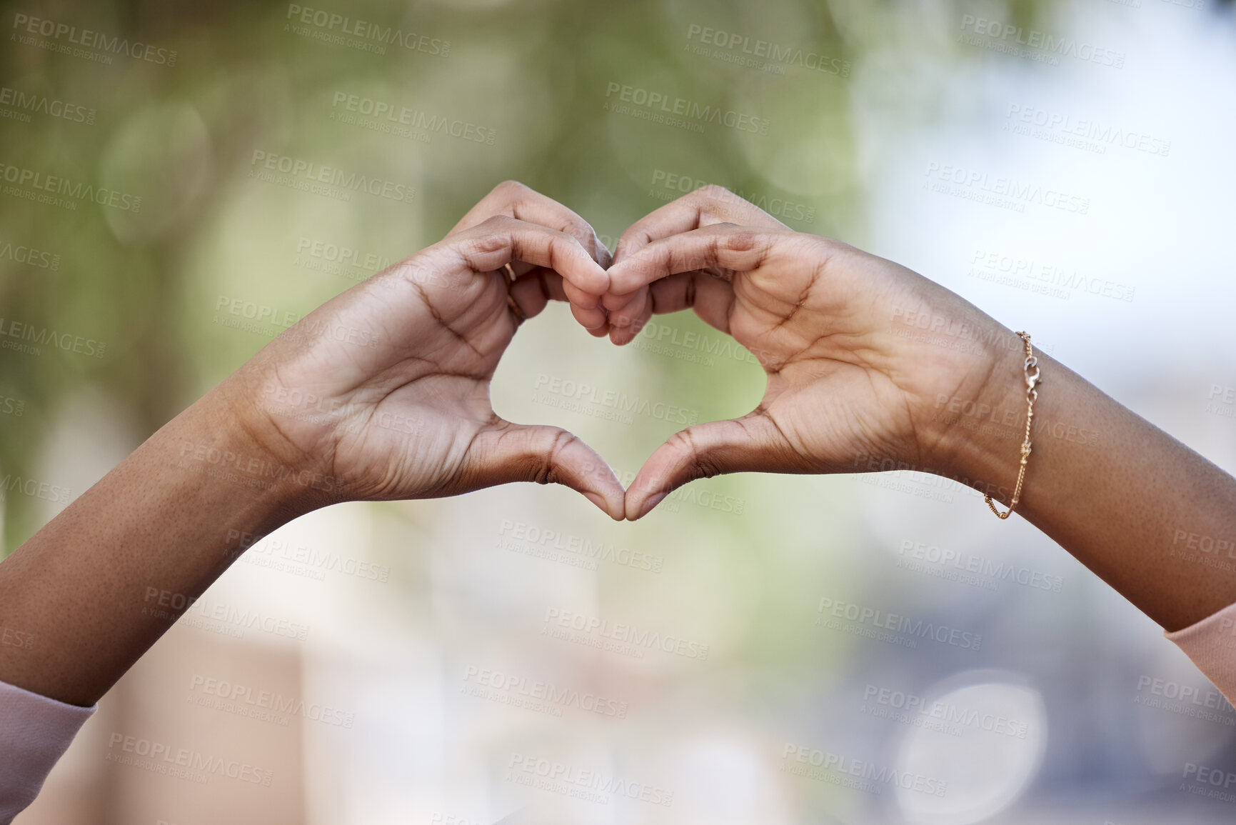 Buy stock photo Woman, heart hands and love in nature for compassion, romance or care against a blurred background. Closeup of female person with loving symbol, gesture or sign for valentines day in the outdoors