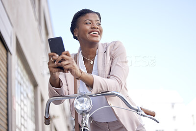 Buy stock photo Happy business woman in city with bike, phone and morning commute, checking location or social media. Eco friendly transport bicycle, cycling and African girl with mobile app, smile and work travel.