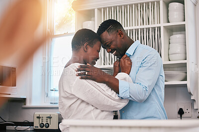 Buy stock photo Hug, happy and a mature black couple in the kitchen with care, love and quality time in the morning. Happy, together and an African man and woman with gratitude or kindness in a house for romance