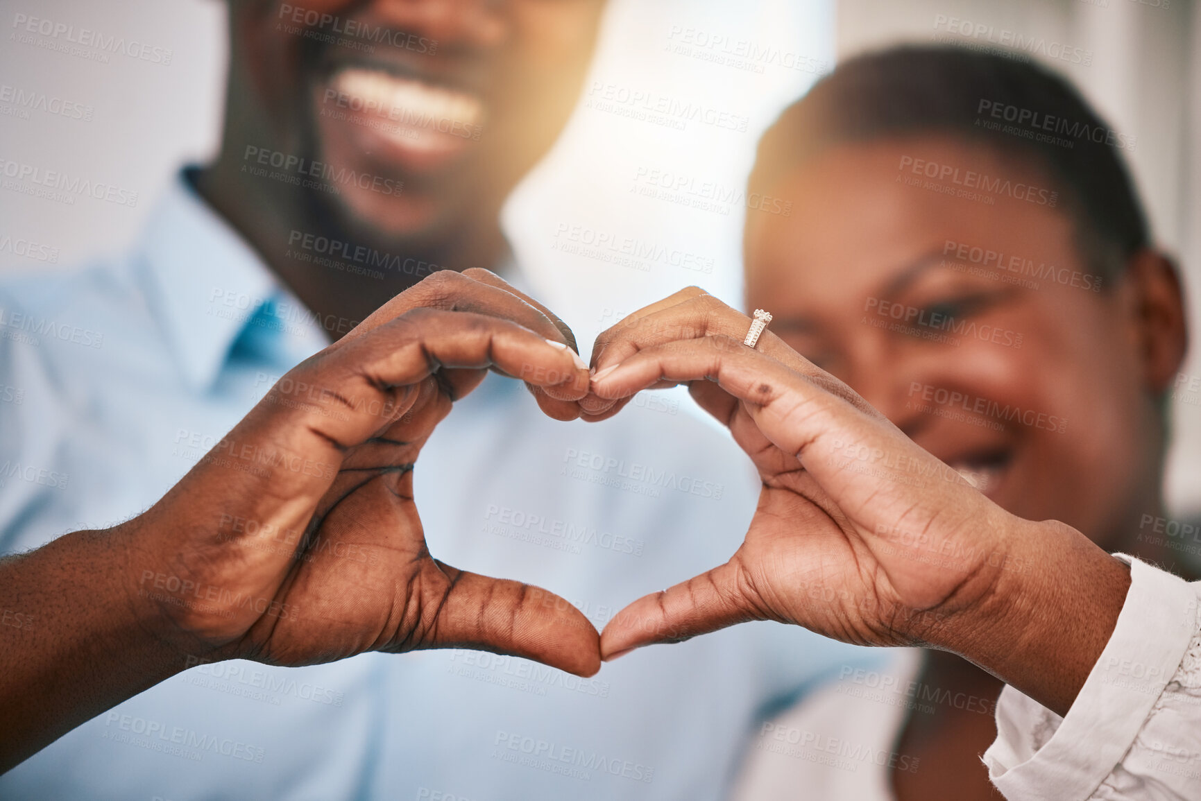 Buy stock photo Hands in heart, love and couple with sign by home with gesture for love, support and care. Emoji, happy and closeup of black man and woman with shape for bonding, commitment and healthy marriage