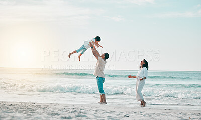 Buy stock photo Beach, family and father lifting boy child with love, freedom and travel celebration in nature. Flying, fun and parents with kid at the ocean for bond, happy and airplane game while traveling in Bali