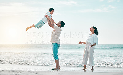 Buy stock photo Family, beach and father lifting boy child with love, freedom and travel celebration in nature. Flying, fun and parents with kid at the ocean for bond, happy and airplane game while traveling in Bali